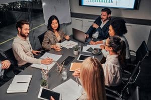 Group of a business team having a chat in a conference room